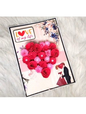 Quilled red flowers in heart greeting card Quilled red flowers in heart greeting card