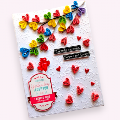 Quilled colorful hearts falling Greeting card