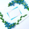 Quilled Blue Corner Flowers Greeting Card image Quilled Blue Corner Flowers Greeting Card image