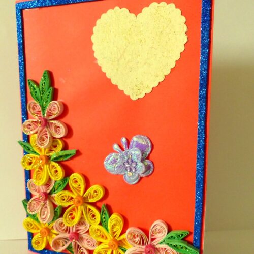 Beautiful Yellow And Pink Flowers On Red Greeting Card image