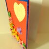 Beautiful Yellow And Pink Flowers On Red Greeting Card image Beautiful Yellow And Pink Flowers On Red Greeting Card image