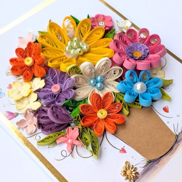 PXL_20260621_125456687 Multicolored Quilled flowers greeting cad