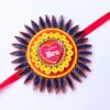 PXL_20260816_045318469 Quilled Rakhi - Yellow orange - Big size