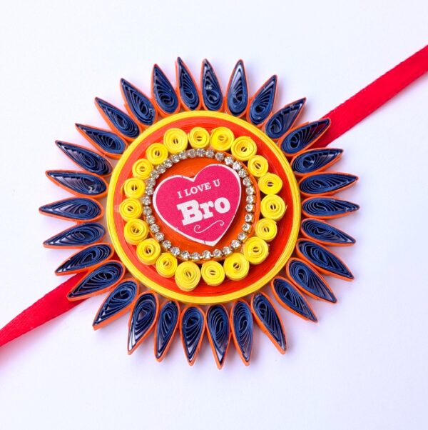 PXL_20260816_045318469 Quilled Rakhi - Yellow orange - Big size