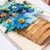 PXL_20260913_095313283 A4 size Blue quilled flowers Greeting Card