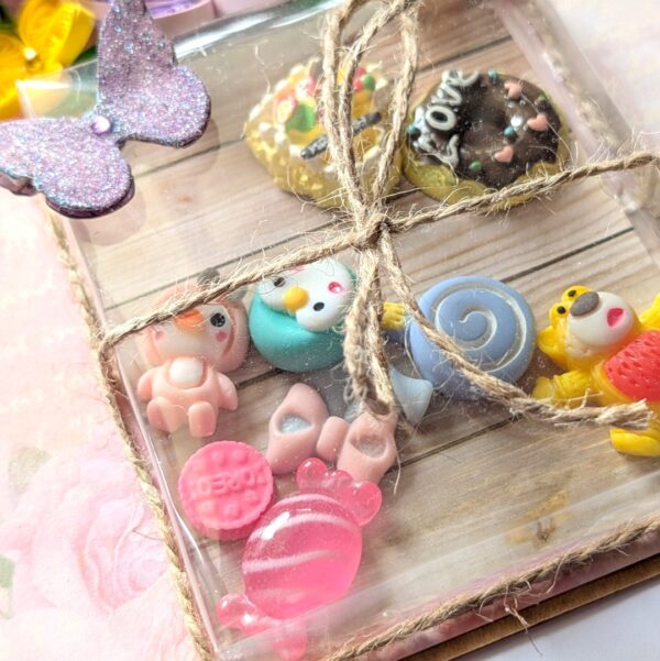 PXL_20260920_064239476 Multicolor Quilled flowers with cute shaker charms